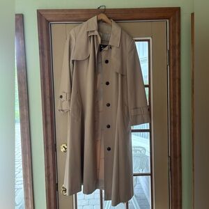 vintage and rare lined trenchcoat by Etienne Aigner, circa 1970s. Size 10.
